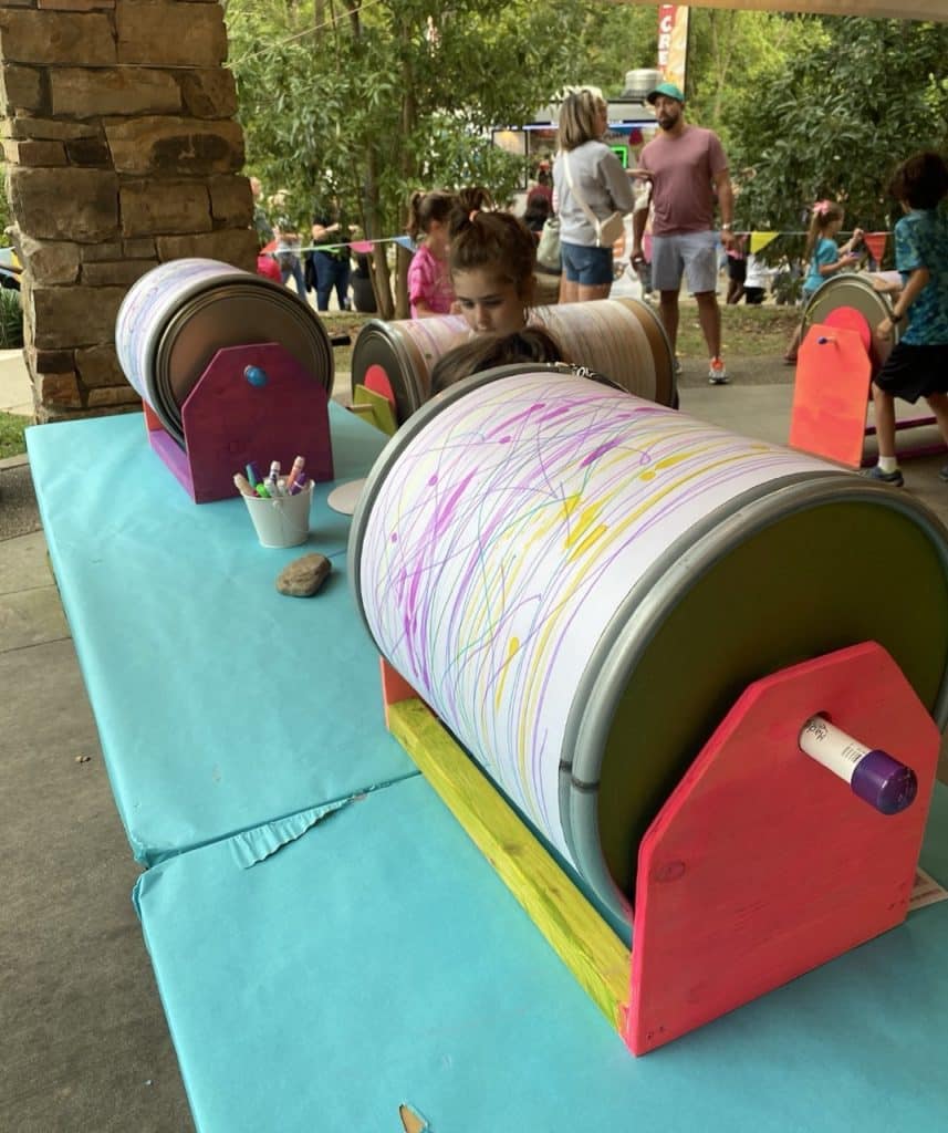 Small Hands Big Art spinning barrel made with 10 gallon drums